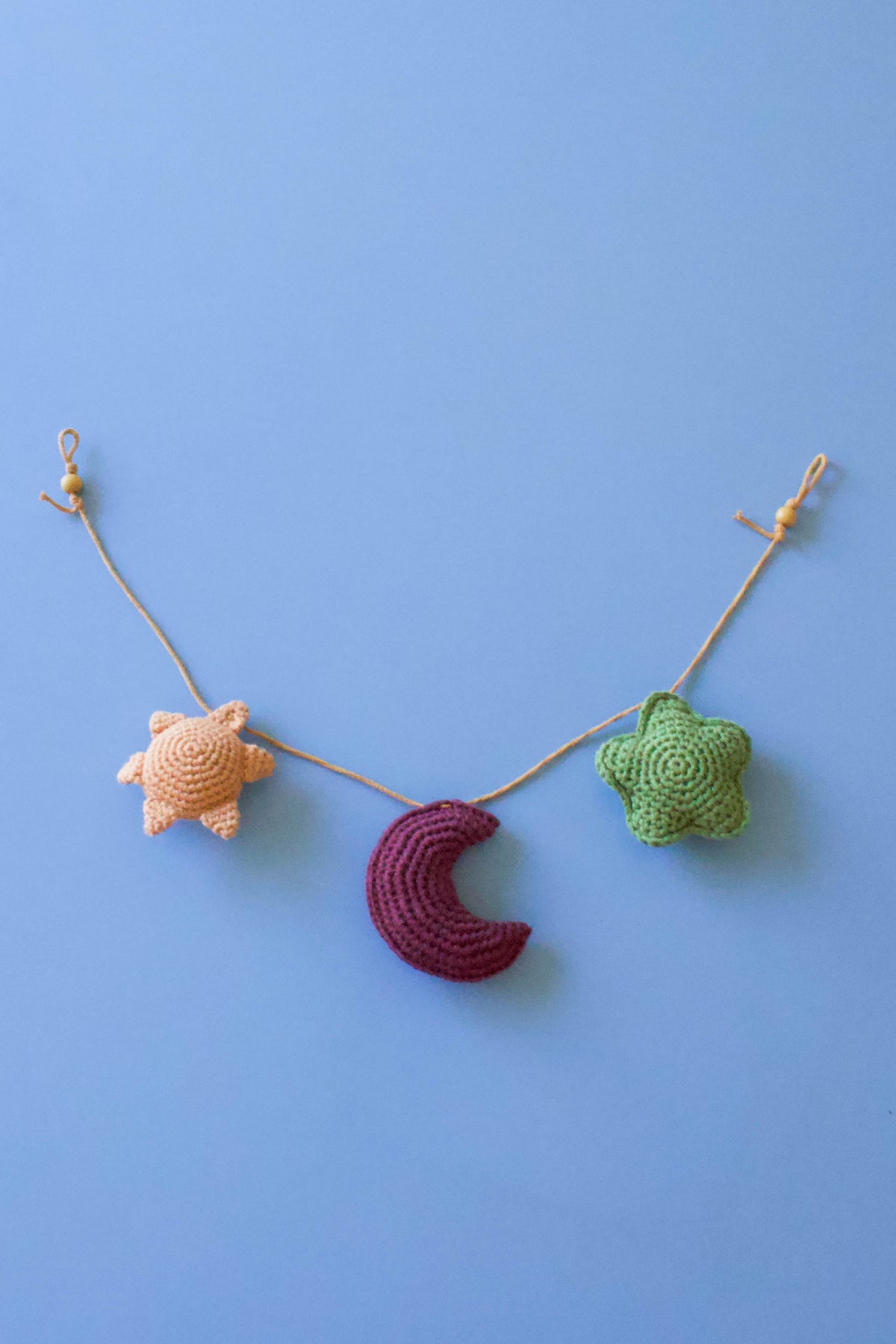 Handmade baby crochet wall hanger - yellow aubergine green