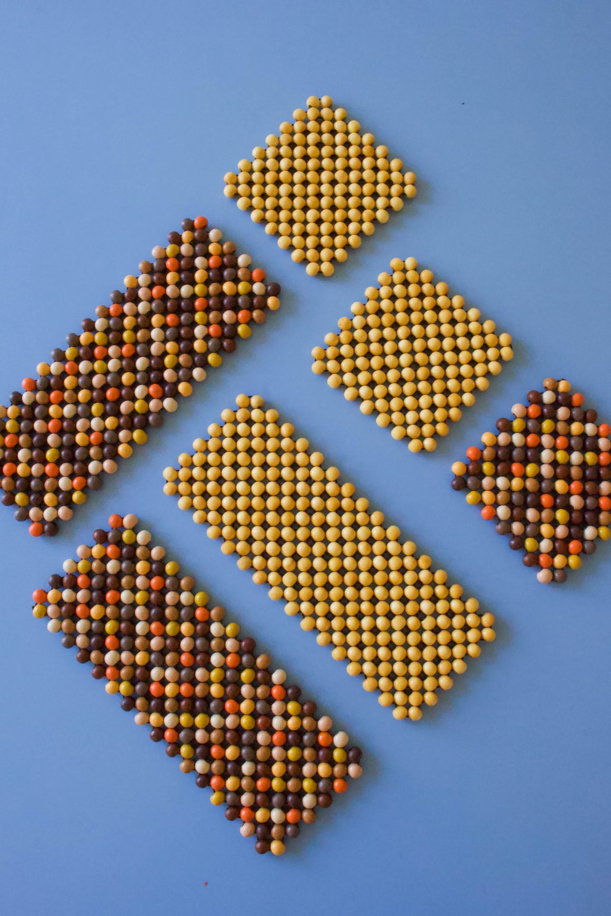Handmade set of two wood multi-colored coasters square