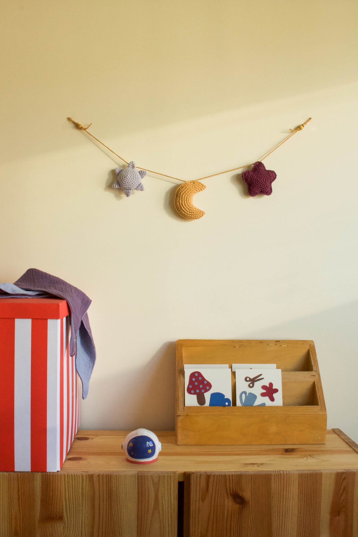 Handmade baby crochet wall hanger - light blue yellow aubergine