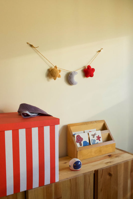 Handmade baby crochet wall hanger - yellow light blue red