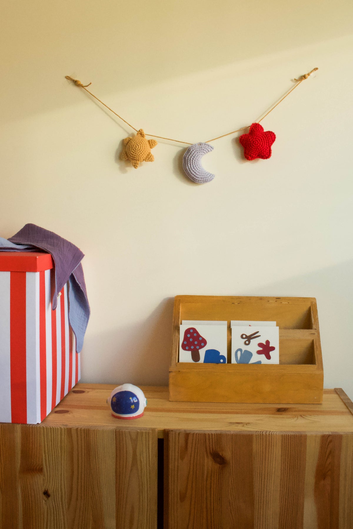 Handmade baby crochet wall hanger - yellow light blue red